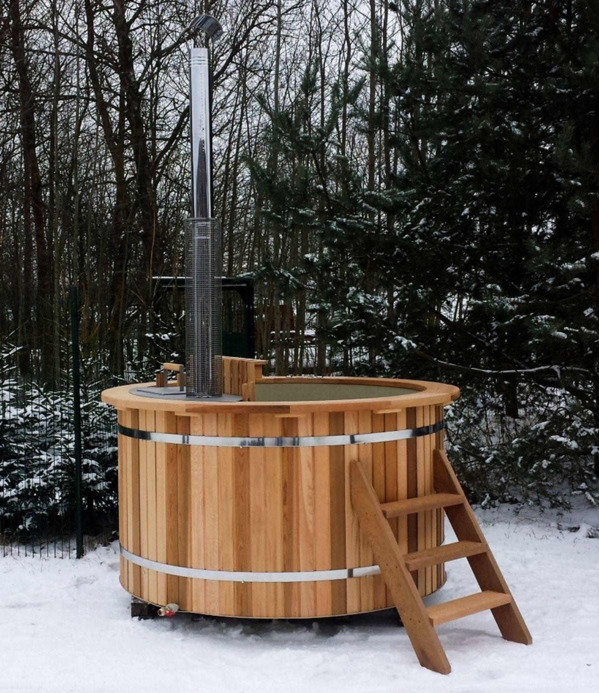 Hot tub in winter forest
